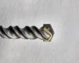 Broca para hormigón con punta de cincel, mostrando diferentes tipos de brocas para hormigón.