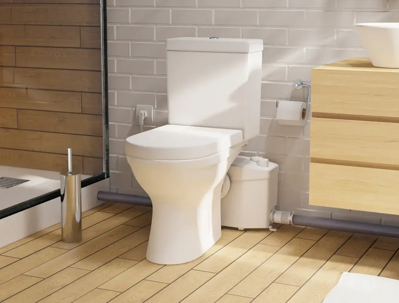 Moderno baño con inodoro triturador, ducha y mueble de madera. Las opiniones sobre este tipo de inodoros son muy positivas.